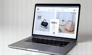 Laptop displaying an e-commerce website